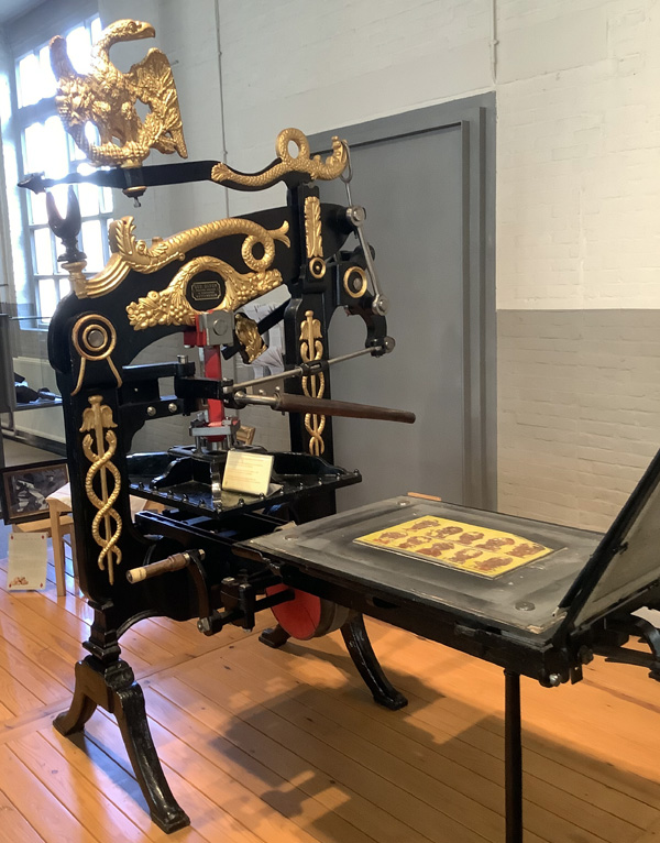 Early hand operated printing press from Turnhout Museum of Playing Cards