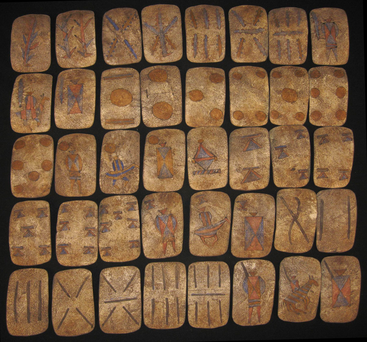 pack of 40 Apache playing-cards made of skin (deer). © The Trustees of the British Museum