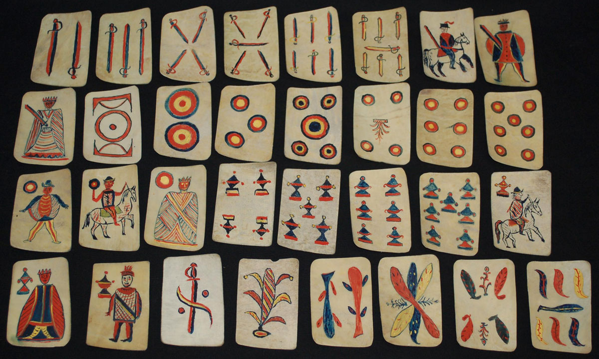 Apache playing cards made of rawhide. © The Trustees of the British Museum